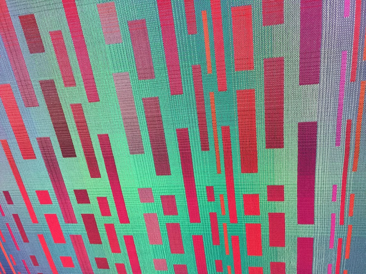 Red and green gradients in a double weave